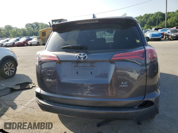 2018 Toyota RAV4 LE with VIN JTMBFREV5JJ736492, listed as a Copart auction lot 63794335 with 97,374 mi miles and Clean title. Bid and sale history available at DreamBid. Image 6.