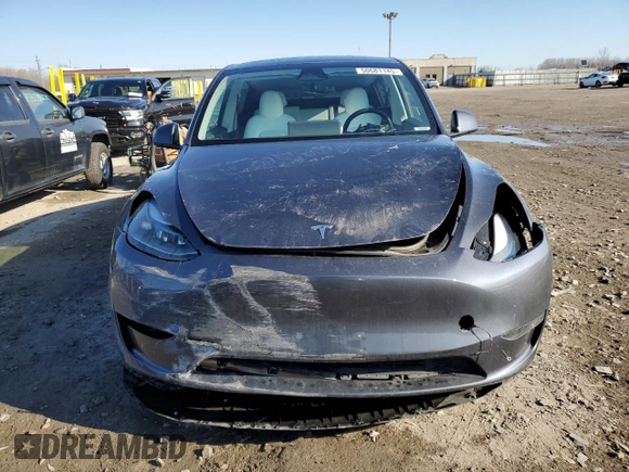 2023 Tesla Model Y Long Range z VIN 7SAYGDEE0PA206005, wystawiony jako Copart lot #50681145 z przebiegiem 31 989 mil mil oraz Szkoda całkowita • Salvage title. Historia ofert i sprzedaży dostępna na DreamBid. Obrazek 5.