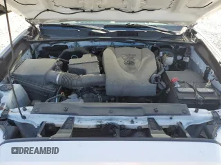 2019 Toyota Tacoma SR z VIN 3TMCZ5AN3KM286310, wystawiony jako Copart lot #60290625 z przebiegiem 51 845 mil mil oraz Szkoda całkowita • Salvage title. Historia ofert i sprzedaży dostępna na DreamBid. Obrazek 11.