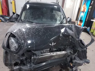 2016 MINI Countryman S z VIN WMWZC5C55GWU00739, wystawiony jako IAAI lot #41333148 z przebiegiem 74 259 mil mil oraz . Historia ofert i sprzedaży dostępna na DreamBid. Obrazek 13.