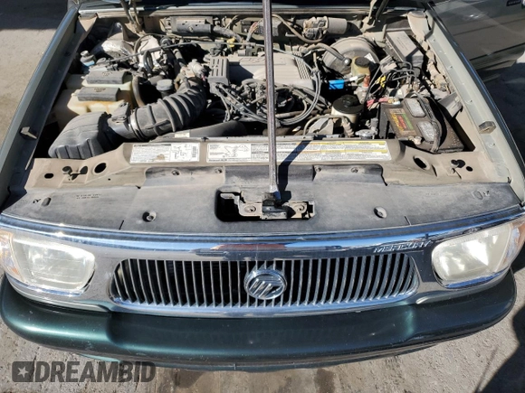 1999 Mercury Mountaineer z VIN 4M2ZU55P0XUJ06301, wystawiony jako Copart lot #81357924 z przebiegiem 181 750 mil mil oraz Szkody całkowita. Historia ofert i sprzedaży dostępna na DreamBid. Obrazek 12.