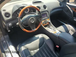 2009 Mercedes-Benz SL 550 with VIN WDBSK71F79F146967, listed as a Copart auction lot 62679494 with 57,412 mi miles and Salvage title. Bid and sale history available at DreamBid. Image 8.