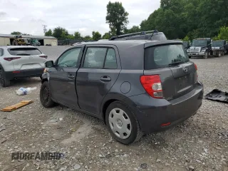 2009 Scion xD with VIN JTKKU10499J045881, listed as a Copart auction lot 60923855 with 125,762 mi miles and Salvage title. Bid and sale history available at DreamBid. Image 2.