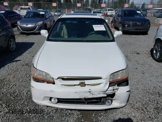 2000 Honda Accord EX with VIN 1HGCG1656YA060793, listed as a IAAI auction lot 41884449 with 232,519 mi miles and . Bid and sale history available at DreamBid. Image 12.