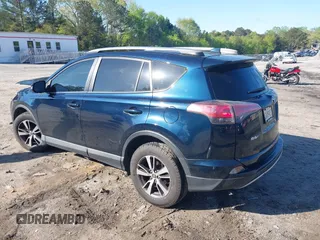 2018 Toyota RAV4 XLE with VIN JTMWFREV5JJ739619, listed as a IAAI auction lot 42017343 with 126,810 mi miles and . Bid and sale history available at DreamBid. Image 3.