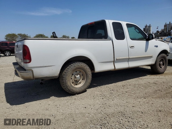 2003 Ford F-150 XL with VIN 2FTRX17213CA05950, listed as a Copart auction lot 54435115 with 310,503 mi miles and Salvage title. Bid and sale history available at DreamBid. Image 3.