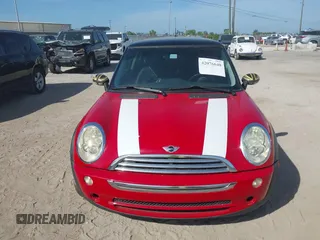 2006 MINI Hardtop with VIN WMWRC33506TK17012, listed as a IAAI auction lot 42076648 with 101,852 mi miles and . Bid and sale history available at DreamBid. Image 12.