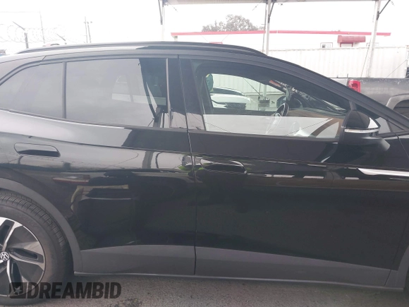 2021 Volkswagen ID.4 Pro S z VIN WVGTMPE26MP065481, wystawiony jako IAAI lot #41719800 z przebiegiem Nie podano mil oraz . Historia ofert i sprzedaży dostępna na DreamBid. Obrazek 14.
