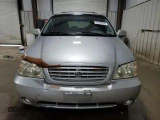 2003 Kia Sedona LX with VIN KNDUP131736467120, listed as a Copart auction lot 61992234 with 133,222 mi miles and Salvage Title. Bid and sale history available at carsss.com. Image 5.