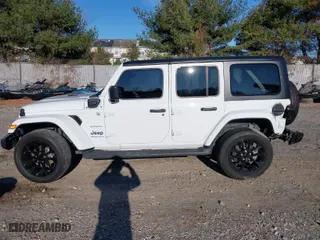 2023 Jeep Wrangler 4xe Sahara with VIN 1C4JJXP61PW684682, listed as a IAAI auction lot 40998281 with 41,138 mi miles. Bid and sale history available at carsss.com. Image 14.