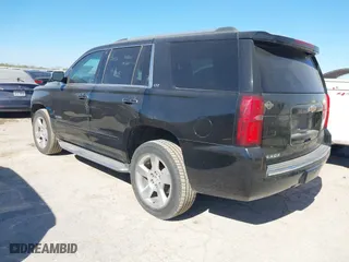 2015 Chevrolet Tahoe LTZ with VIN 1GNSCCKCXFR117525, listed as a IAAI auction lot 41839259 with 143,413 mi miles. Bid and sale history available at carsss.com. Image 3.