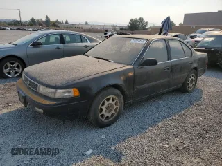 1992 Nissan Maxima z VIN JN1HJ01F1NT007180, wystawiony jako Copart lot #71271334 z przebiegiem 252 299 mil mil oraz Tytuł czysty. Historia ofert i sprzedaży dostępna na DreamBid. Obrazek 1.