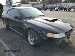2001 Ford Mustang GT Deluxe with VIN 1FAFP42X71F163143, listed as a Copart auction lot 81133184 with 132,716 mi miles and Salvage Title. Bid and sale history available at carsss.com. Image 4.