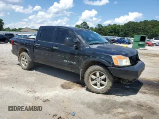 2011 Nissan Titan Pro-4X with VIN 1N6BA0EC6BN313680, listed as a Copart auction lot 60335995 with 241,301 mi miles and Salvage title. Bid and sale history available at DreamBid. Image 4.
