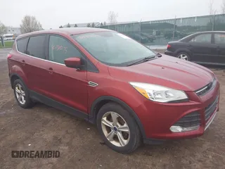 2014 Ford Escape SE with VIN 1FMCU9G97EUC50213, listed as a IAAI auction lot 42130075 with 235,406 mi miles. Bid and sale history available at carsss.com. Image 1.