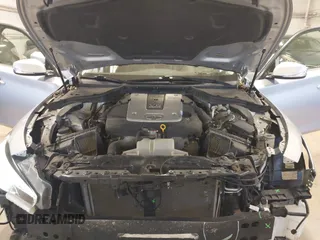 2015 Infiniti Q50 Premium with VIN JN1BV7AR3FM396154, listed as a IAAI auction lot 41978988 with 110,109 mi miles. Bid and sale history available at carsss.com. Image 10.