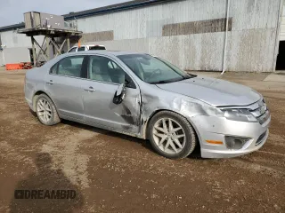 2012 Ford Fusion SEL with VIN 3FAHP0JA3CR363781, listed as a Copart auction lot 49696235 with 185,280 mi miles and Clean Title. Bid and sale history available at DreamBid. Image 4.