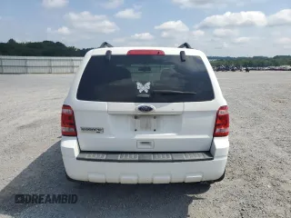 2012 Ford Escape XLT with VIN 1FMCU9D73CKC29497, listed as a Copart auction lot 63211965 with 142,134 mi miles and Salvage title. Bid and sale history available at DreamBid. Image 6.