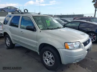 2004 Ford Escape Limited with VIN 1FMCU04104KA41934, listed as a IAAI auction lot 41444706 with 169,347 mi miles. Bid and sale history available at carsss.com. Image 1.