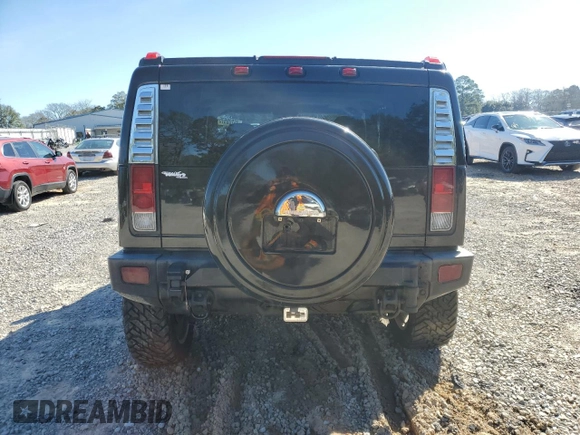 2006 Hummer H2 z VIN 5GRGN23U06H104393, wystawiony jako Copart lot #46208975 z przebiegiem 168 053 mil mil oraz Szkoda całkowita • Salvage title. Historia ofert i sprzedaży dostępna na DreamBid. Obrazek 6.