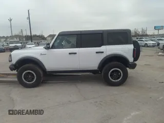 2023 Ford Bronco z VIN 1FMEE5DP9PLB30696, wystawiony jako IAAI lot #41468543 z przebiegiem 12 465 mil mil oraz . Historia ofert i sprzedaży dostępna na DreamBid. Obrazek 14.