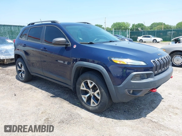 2015 Jeep Cherokee Trailhawk with VIN 1C4PJMBS3FW704622, listed as a IAAI auction lot 42465702 with 96,831 mi miles and . Bid and sale history available at DreamBid. Image 1.