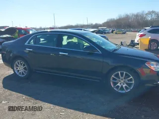 2011 Chevrolet Malibu LTZ with VIN 1G1ZE5E18BF143021, listed as a IAAI auction lot 41802508 with 148,866 mi miles and . Bid and sale history available at DreamBid. Image 13.