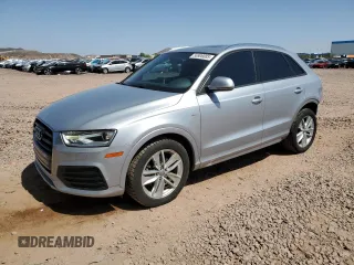 2018 Audi Q3 Premium with VIN WA1ECCFS0JR004256, listed as a Copart auction lot 56906885 with 66,581 mi miles and Salvage title. Bid and sale history available at DreamBid. Image 1.