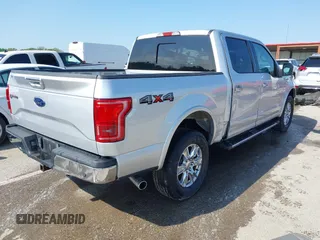 2015 Ford F-150 XLT with VIN 1FTEW1EG8FKE61864, listed as a IAAI auction lot 42120436 with 129,448 mi miles and . Bid and sale history available at DreamBid. Image 4.