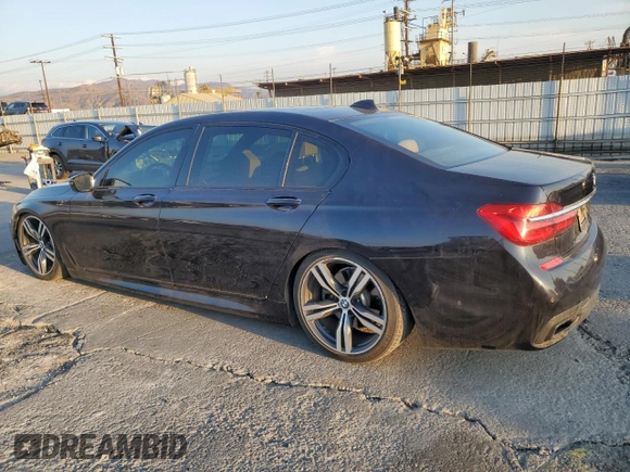 2017 BMW 7 Series 750i with VIN WBA7F0C57HGM21136, listed as a Copart auction lot 88525335 with 102,508 mi miles and Salvage title. Bid and sale history available at DreamBid. Image 2.