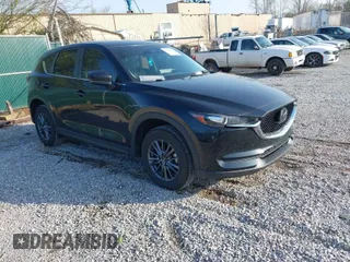 2021 Mazda CX-5 Touring with VIN JM3KFACM5M1313631, listed as a IAAI auction lot 41928912 with 41,448 mi miles. Bid and sale history available at carsss.com. Image 1.