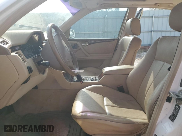 2002 Mercedes-Benz E-Class with VIN WDBJF65J12B434067, listed as a Copart auction lot 74250764 with 102,118 mi miles and Salvage Title. Bid and sale history available at carsss.com. Image 7.