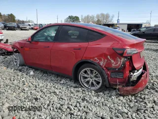 2022 Tesla Model Y Long Range z VIN 7SAYGDEE5NF387781, wystawiony jako Copart lot #50248215 z przebiegiem 24 173 mil mil oraz Szkoda całkowita • Salvage title. Historia ofert i sprzedaży dostępna na DreamBid. Obrazek 2.