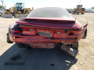 2000 Ford Escort ZX2 with VIN 3FAKP1130YR137847, listed as a Copart auction lot 69797534 with 96,150 mi miles and Salvage Title. Bid and sale history available at carsss.com. Image 6.