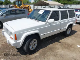 2001 Jeep Cherokee Sport with VIN 1J4FT48S71L503551, listed as a IAAI auction lot 42660835 with Not provided miles and . Bid and sale history available at DreamBid. Image 2.