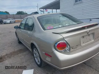 2003 Nissan Maxima SE z VIN JN1DA31D33T510169, wystawiony jako IAAI lot #42339254 z przebiegiem 182 862 mil mil oraz . Historia ofert i sprzedaży dostępna na DreamBid. Obrazek 3.