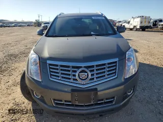 2013 Cadillac SRX Premium Collection z VIN 3GYFNEE35DS605779, wystawiony jako Copart lot #84451744 z przebiegiem 60 339 mil mil oraz Czysty tytuł • Clean title. Historia ofert i sprzedaży dostępna na DreamBid. Obrazek 5.