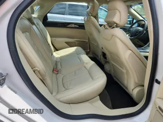 2015 Lincoln MKZ Hybrid z VIN 3LN6L2LU7FR609215, wystawiony jako Copart lot #63211665 z przebiegiem 149 636 mil mil oraz Nie do naprawy • Non repairable. Historia ofert i sprzedaży dostępna na DreamBid. Obrazek 10.