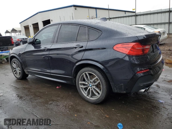 2016 BMW X4 xDrive28i with VIN 5UXXW3C59G0R20451, listed as a Copart auction lot 76909023 with 96,076 mi miles. Bid and sale history available at carsss.com. Image 2.