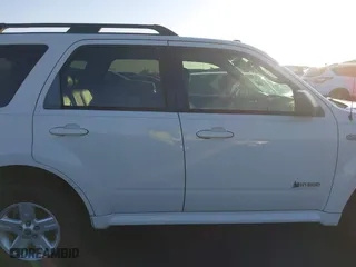 2009 Mercury Mariner Hybrid with VIN 4M2CU29399KJ05674, listed as a IAAI auction lot 40843807 with 194,987 mi miles. Bid and sale history available at carsss.com. Image 14.