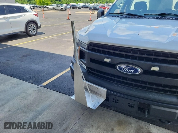 2018 Ford F-150 XL with VIN 1FTNF1E52JKE87531, listed as a IAAI auction lot 42740984 with 121,670 mi miles and . Bid and sale history available at DreamBid. Image 12.
