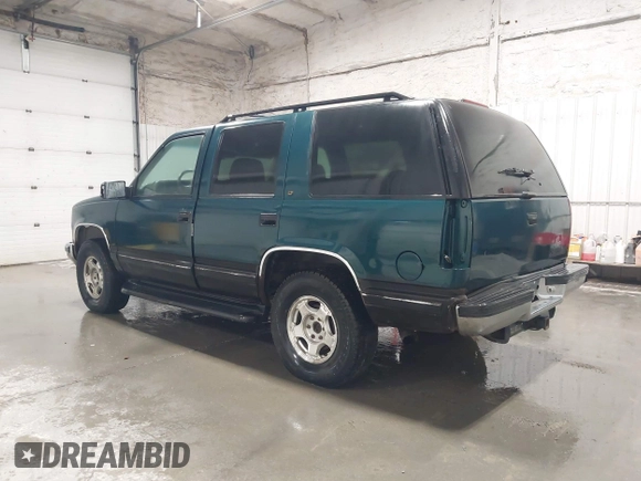 1996 Chevrolet Tahoe z VIN 1GNEK13R4TJ417000, wystawiony jako IAAI lot #41992121 z przebiegiem 166 215 mil mil oraz . Historia ofert i sprzedaży dostępna na DreamBid. Obrazek 3.