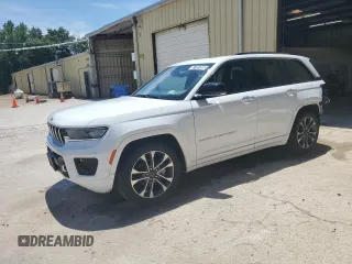 2022 Jeep Grand Cherokee Overland with VIN 1C4RJHDG0N8540256, listed as a Copart auction lot 57701365 with 61,045 mi miles and Clean title. Bid and sale history available at DreamBid. Image 1.