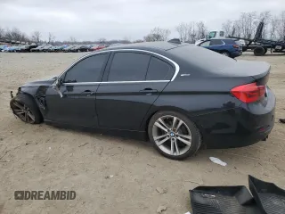 2017 BMW 3 Series 330e iPerformance with VIN WBA8E1C58HK895185, listed as a Copart auction lot 49287055 with 61,391 mi miles and Salvage Title. Bid and sale history available at carsss.com. Image 2.
