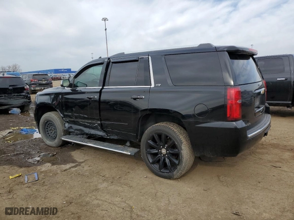 2016 Chevrolet Tahoe LTZ with VIN 1GNSKCKC1GR169159, listed as a Copart auction lot 49651945 with 156,166 mi miles and Salvage Title. Bid and sale history available at carsss.com. Image 2.