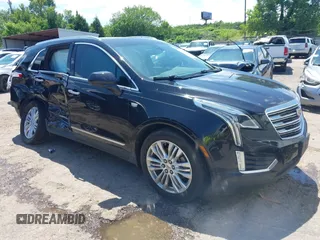 2017 Cadillac XT5 Premium Luxury FWD with VIN 1GYKNCRS9HZ149587, listed as a IAAI auction lot 42412694 with 94,995 mi miles and . Bid and sale history available at DreamBid. Image 1.