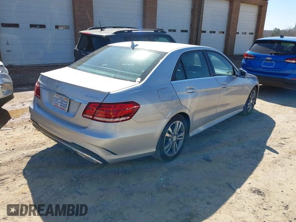 2014 Mercedes-Benz E-Class E 250 BlueTEC Luxury with VIN WDDHF0EB6EA967831, listed as a IAAI auction lot 41660612 with 187,041 mi miles. Bid and sale history available at carsss.com. Image 4.