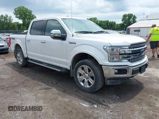 2018 Ford F-150 XL z VIN 1FTEW1EG7JKE76476, wystawiony jako IAAI lot #42575219 z przebiegiem 183 308 mil mil oraz . Historia ofert i sprzedaży dostępna na DreamBid. Obrazek 1.