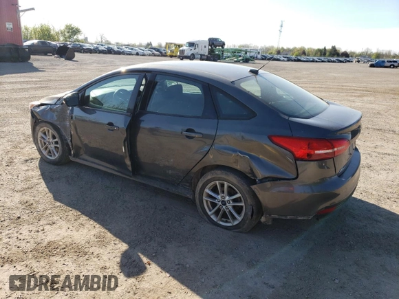 2018 Ford Focus SE z VIN 1FADP3FE4JL306237, wystawiony jako Copart lot #56482215 z przebiegiem 102 241 mil mil oraz Czysty tytuł • Clean title. Historia ofert i sprzedaży dostępna na DreamBid. Obrazek 2.