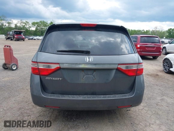 2012 Honda Odyssey EX z VIN 5FNRL5H45CB084342, wystawiony jako IAAI lot #42329303 z przebiegiem 173 711 mil mil oraz . Historia ofert i sprzedaży dostępna na DreamBid. Obrazek 16.